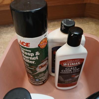 Chrome trash can double organizer with household cleaning chemicals - brushes and sponges