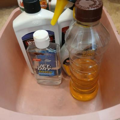 Chrome trash can double organizer with household cleaning chemicals - brushes and sponges