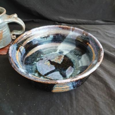Signed pottery pieces - two bowls and a mug