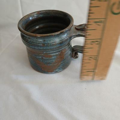 Signed pottery pieces - two bowls and a mug