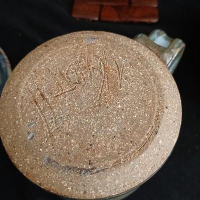 Signed pottery pieces - two bowls and a mug