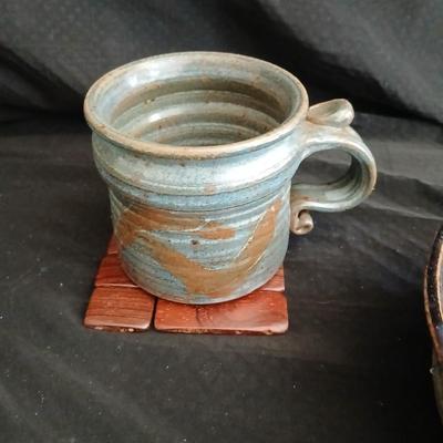 Signed pottery pieces - two bowls and a mug