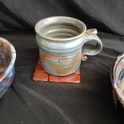 Signed pottery pieces - two bowls and a mug