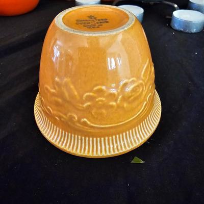 Small orange enamel sugar dish with hand painted wooden wall art, chalkware fruit and more