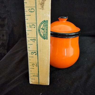 Small orange enamel sugar dish with hand painted wooden wall art, chalkware fruit and more