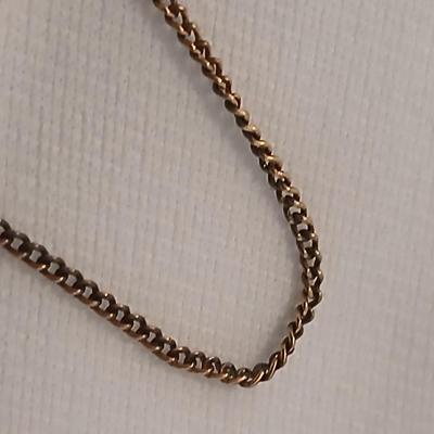 Gold toned Butterfly necklace with cross in the center and matching earrings
