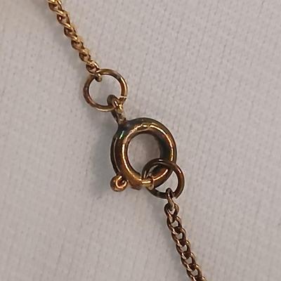 Gold toned Butterfly necklace with cross in the center and matching earrings