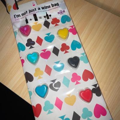 G286-Large lot of wine gift bags with attached drink markers plus bin