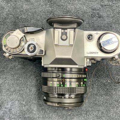 Vintage Canon AE-1 Program SLR Camera with 50mm Lens, Case and Neck Strap