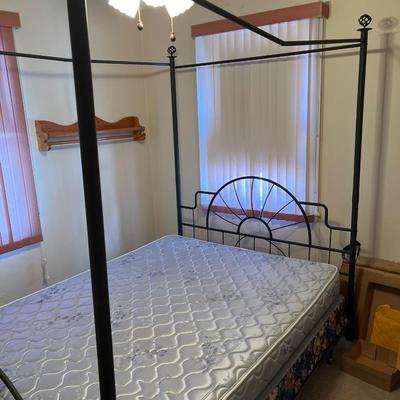 Queen canopy bed with mattress and box spring