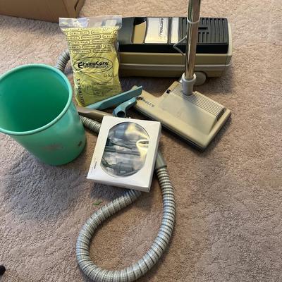 Electrolux vacuum and vintage garbage can