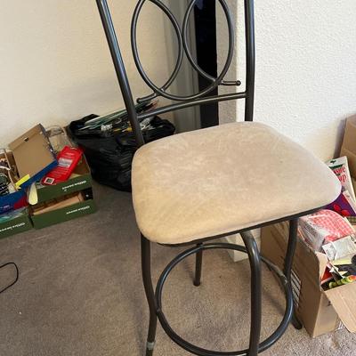 Counter stool, sconce and king bed sheet