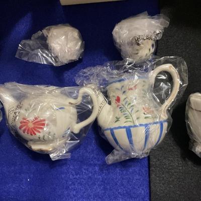 Seven Lenox Small Tea pots in boxes.