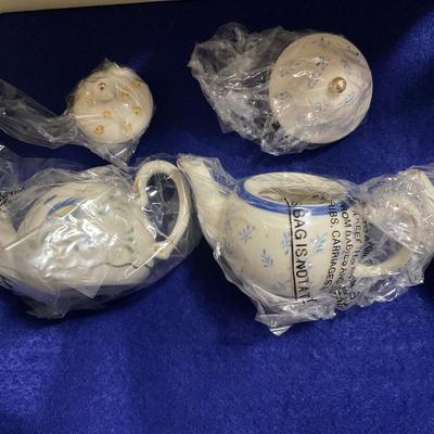 Seven Lenox Small Tea pots in boxes.