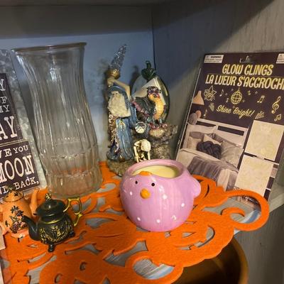 3shelves of vases and misc. decor