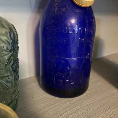 Absolute Pure Milk blue glass & orange-aid bottle tops