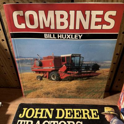 John Deere lunch box and books about tractors