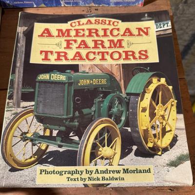 John Deere lunch box and books about tractors