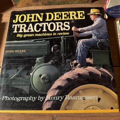 John Deere lunch box and books about tractors