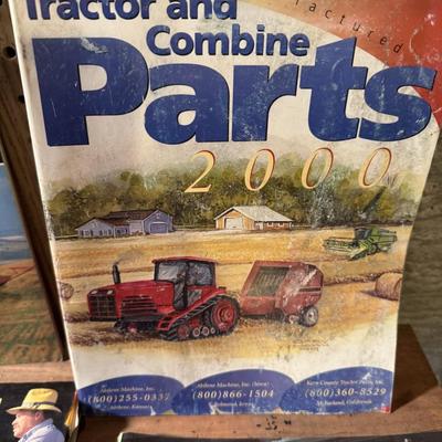 John Deere lunch box and books about tractors