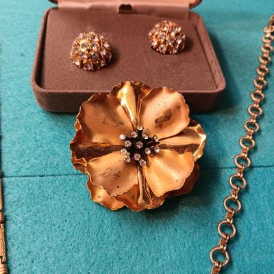 NOLAN MILLER RHINESTONE CLIP ON EARRINGS, GOLD-TONE CHAINS AND BROOCH
