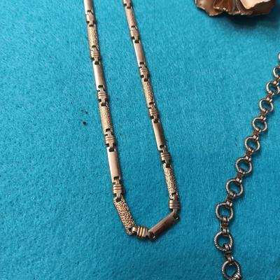 NOLAN MILLER RHINESTONE CLIP ON EARRINGS, GOLD-TONE CHAINS AND BROOCH