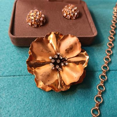 NOLAN MILLER RHINESTONE CLIP ON EARRINGS, GOLD-TONE CHAINS AND BROOCH