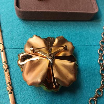 NOLAN MILLER RHINESTONE CLIP ON EARRINGS, GOLD-TONE CHAINS AND BROOCH