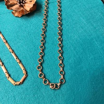 NOLAN MILLER RHINESTONE CLIP ON EARRINGS, GOLD-TONE CHAINS AND BROOCH