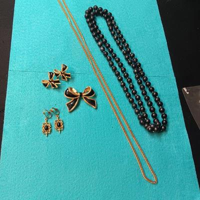 BLACK AND GOLD-TONE COSTUME JEWELRY