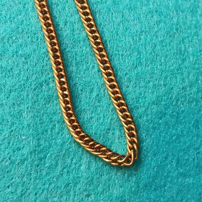 BLACK AND GOLD-TONE COSTUME JEWELRY