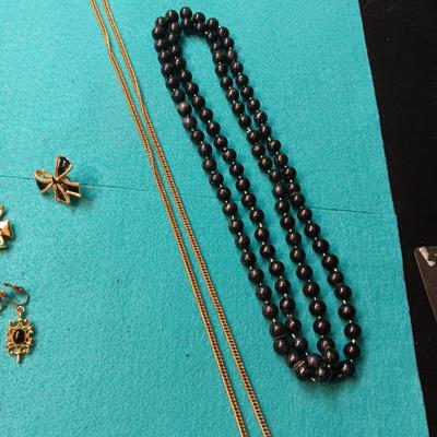 BLACK AND GOLD-TONE COSTUME JEWELRY