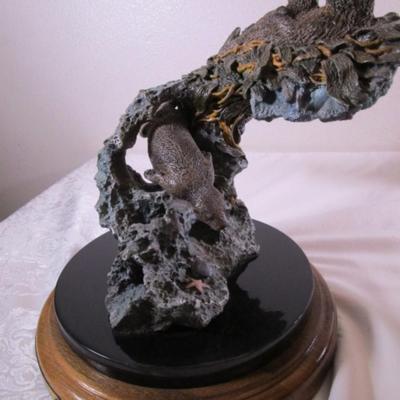 Joe Slockbower Mama, baby & one other sea otter sculpture