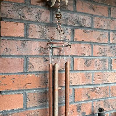 4 METAL TIKI TORCH HOLDERS AND SUN/MOON/STAR WIND CHIME