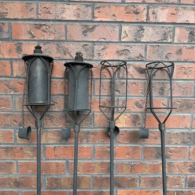 4 METAL TIKI TORCH HOLDERS AND SUN/MOON/STAR WIND CHIME