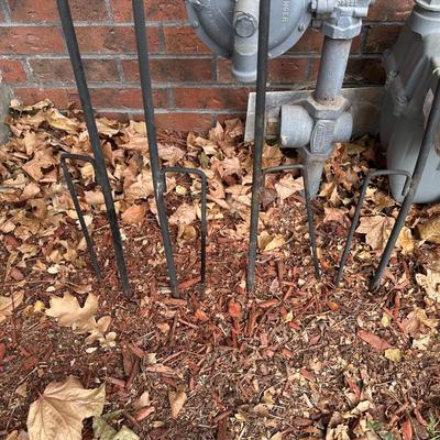 4 METAL TIKI TORCH HOLDERS AND SUN/MOON/STAR WIND CHIME