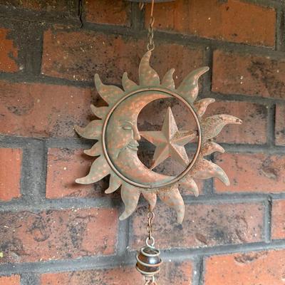 4 METAL TIKI TORCH HOLDERS AND SUN/MOON/STAR WIND CHIME