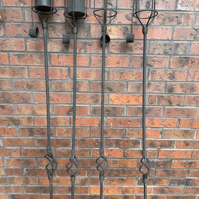 4 METAL TIKI TORCH HOLDERS AND SUN/MOON/STAR WIND CHIME
