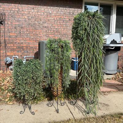 FLOWING FAUX PLANTS IN WEAVED WICKER AND IRON HOLDERS