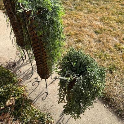 FLOWING FAUX PLANTS IN WEAVED WICKER AND IRON HOLDERS