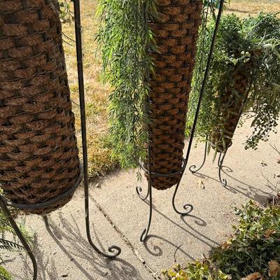 FLOWING FAUX PLANTS IN WEAVED WICKER AND IRON HOLDERS