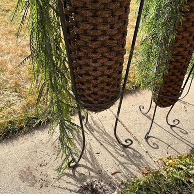FLOWING FAUX PLANTS IN WEAVED WICKER AND IRON HOLDERS