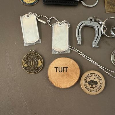 A COLLECTION OF KEYCHAINS, LANYARDS AND MORE