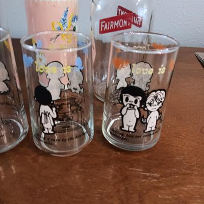 OLDER GLASS MILK BOTTLES AND THERMOS PLUS "LOVE IS" GLASSES