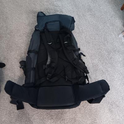 LARGE BACKPACK AND A ZIPPERED BAG