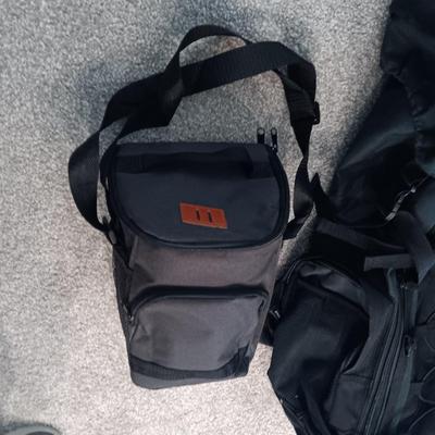 LARGE BACKPACK AND A ZIPPERED BAG