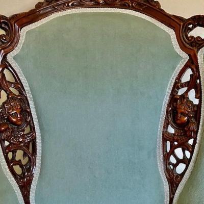 Vintage Green Chair With Carved Wood Design
