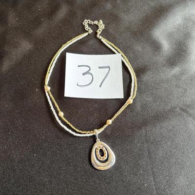 Pretty Gold Tone Necklace