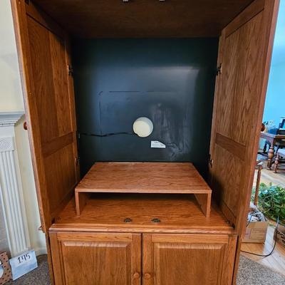Beautiful Amorie Media cabinet with storage and hide-away front doors. Television Optional
