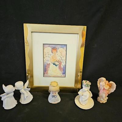 Smaller Angel figures and a framed picture of Angel